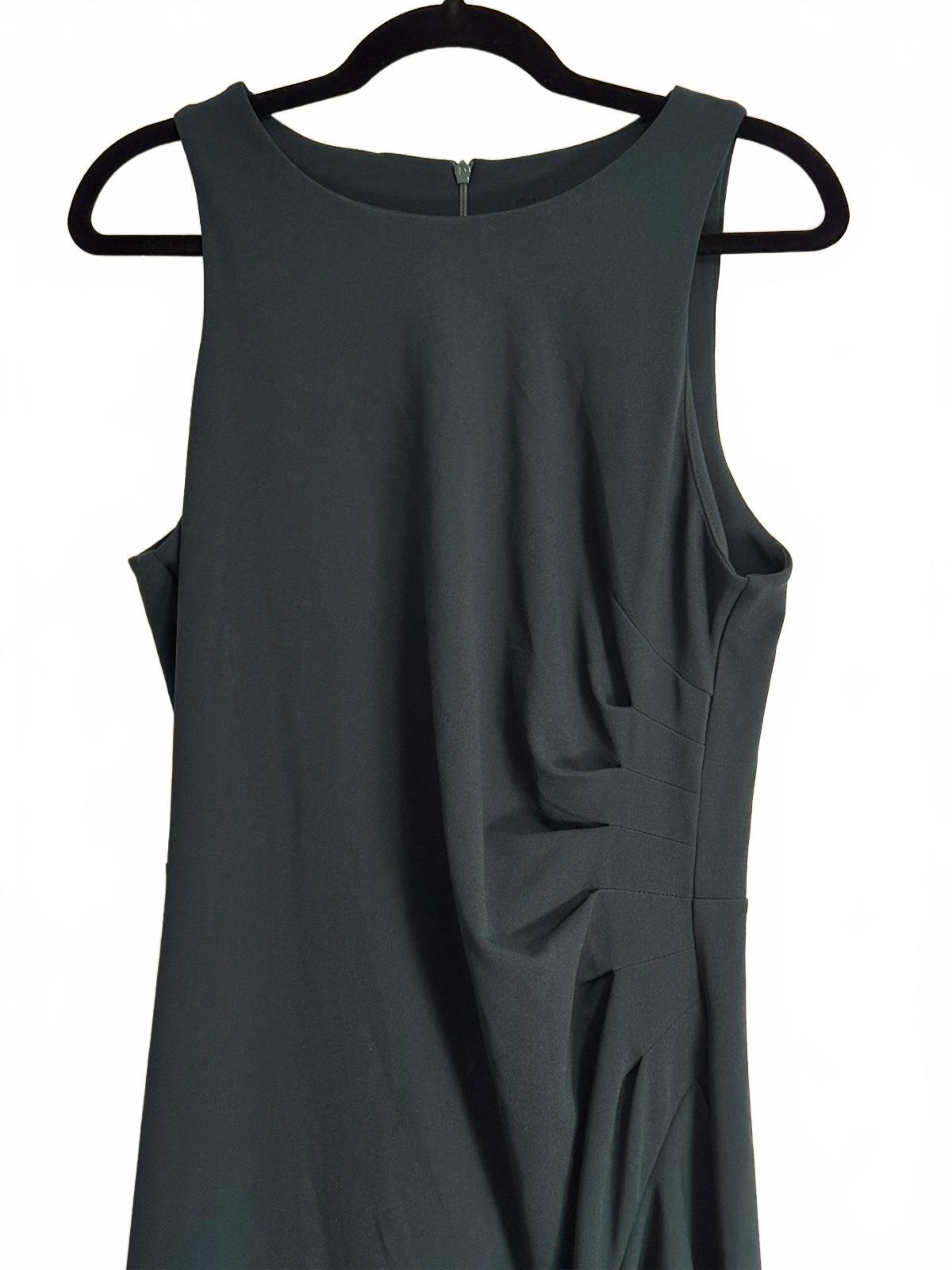 Elegant Sleeveless Dark Green Maxi Dress with Ruffle Detail